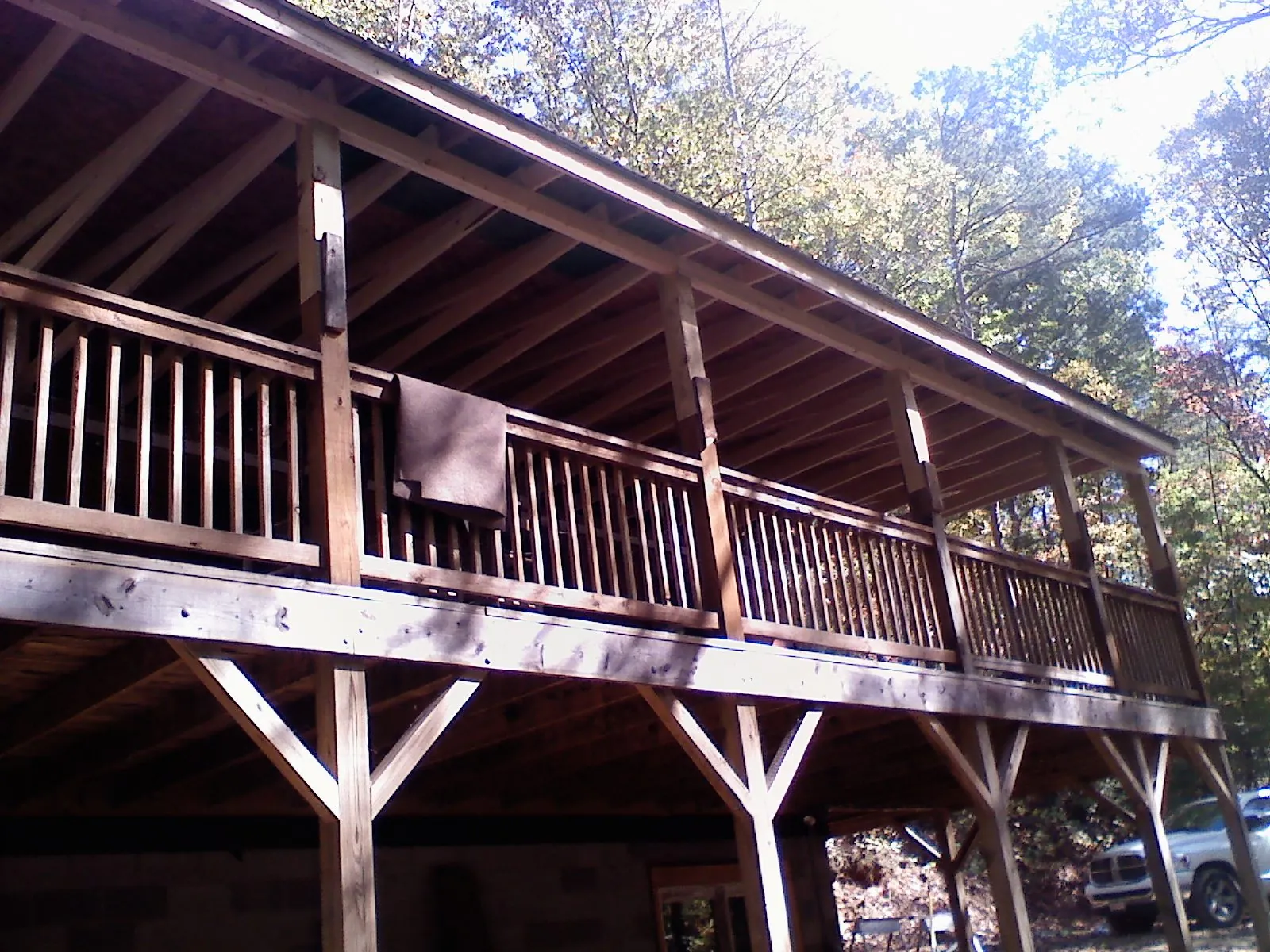 Timber framing under a new elevated porch and deck — Roof Leak Repair in Chisago City by Roofing Brothers